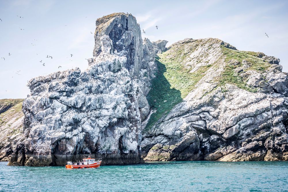 cliffs and boat